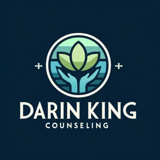 Darin King Counseling logo featuring a stylized lotus flower and open hands, symbolizing healing, growth, and trauma-informed therapy in Pennsylvania.